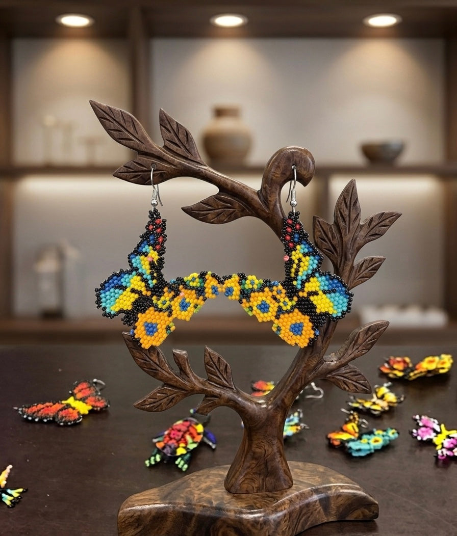 Boucles d'oreilles papillon dansant violet avec perles