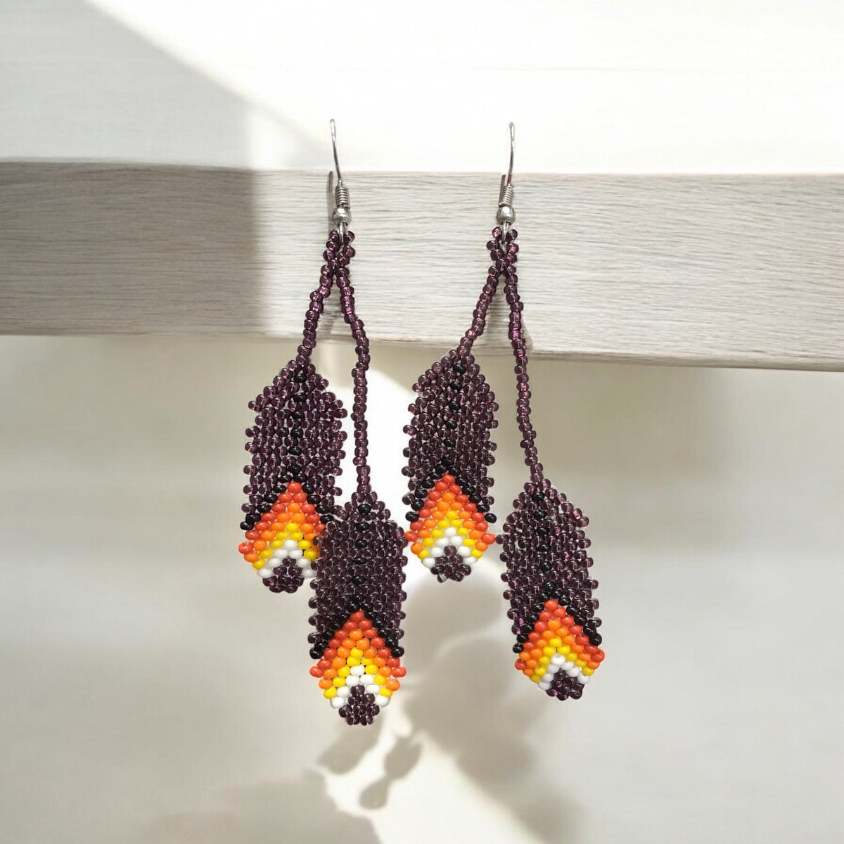 Boucles d'oreilles plume perlées mûre OldTribes™