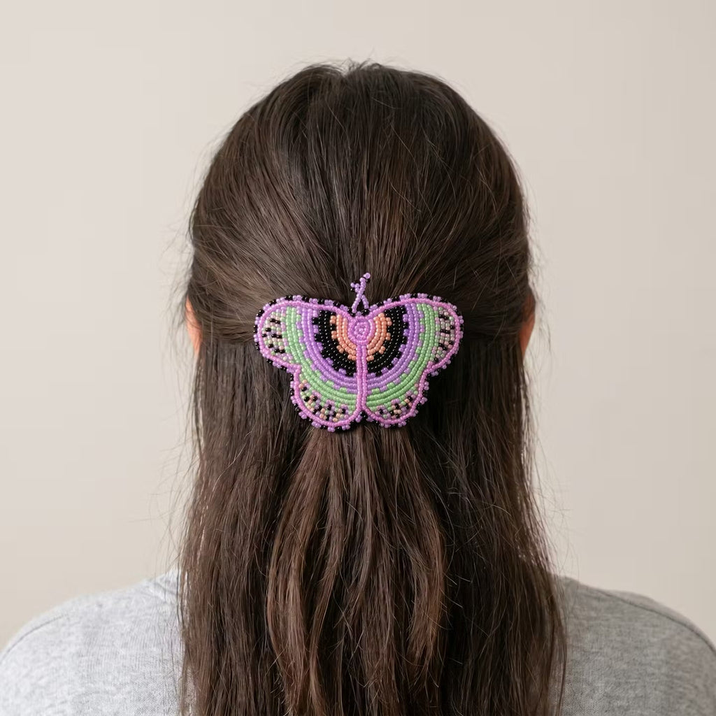 Barrette perlée papillon rose