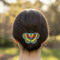 Pince à cheveux ornée de perles papillons bleu aqua et jaunes