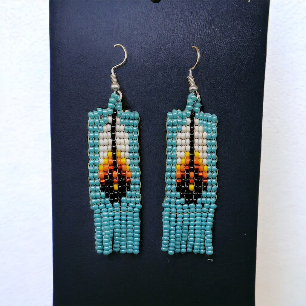 Boucles d'oreilles Oldtribes™ à plumes et perles turquoises