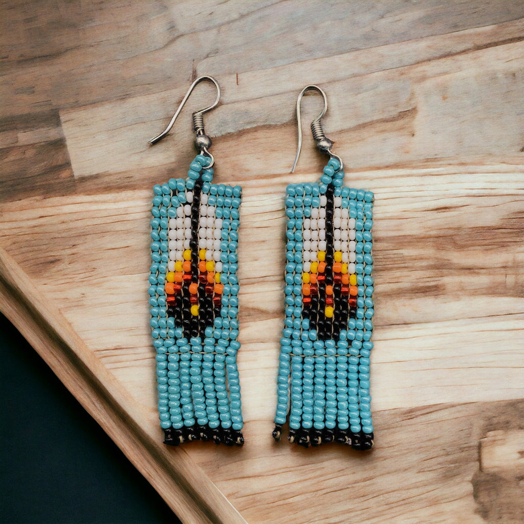 Boucles d'oreilles Oldtribes™ à plumes et perles turquoises