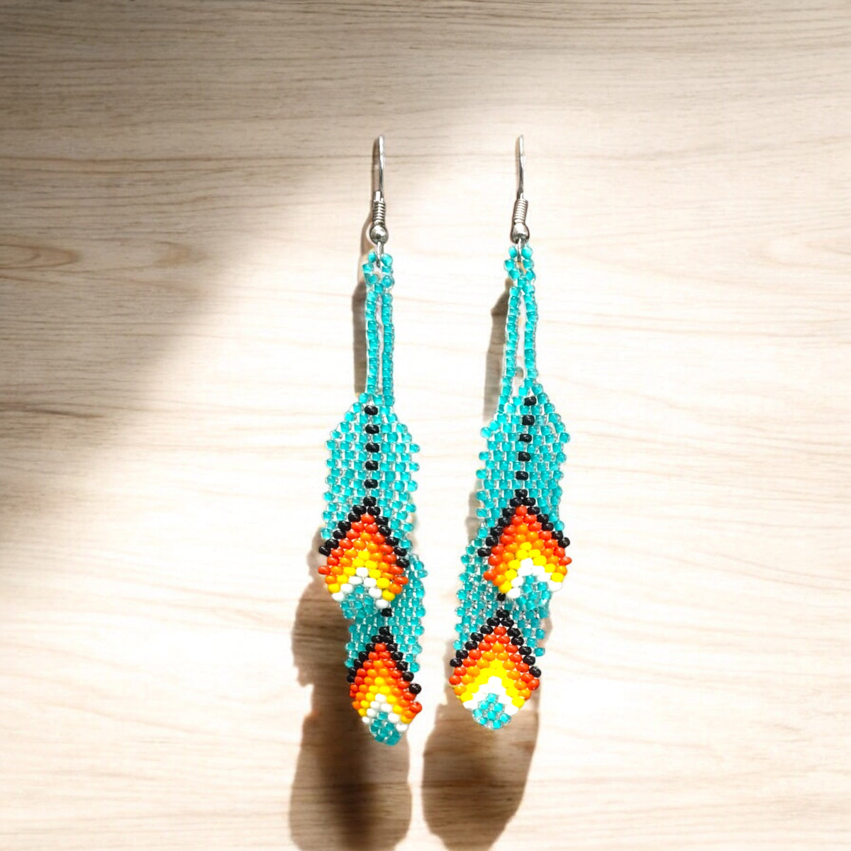 Boucles d'oreilles en plumes perlées turquoises OldTribes™