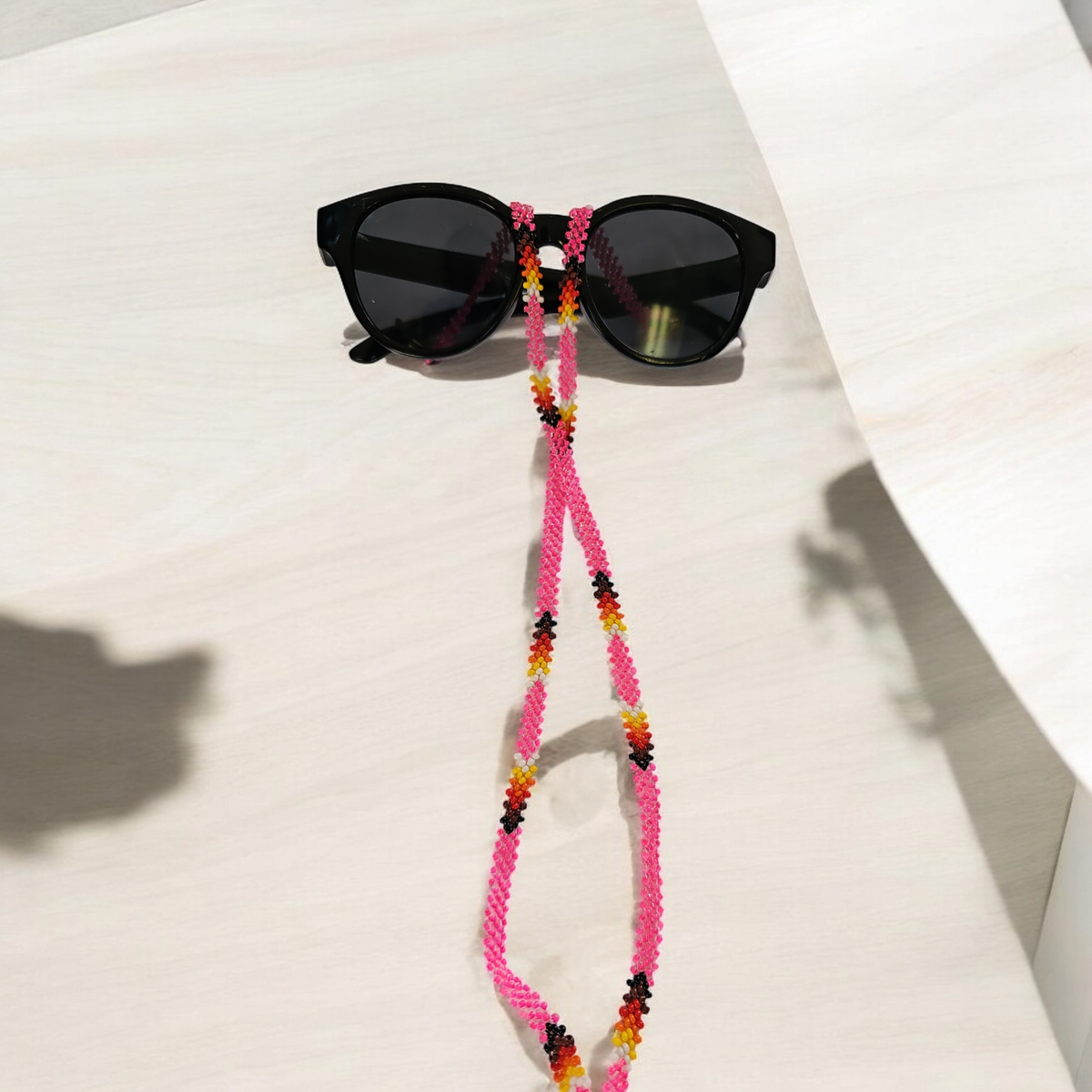 Chaîne à lunettes artisanale tissée à la main (rose)
