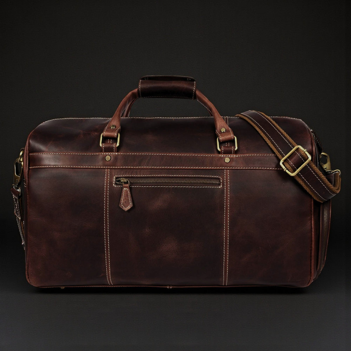 Le sac de voyage The Voyager Duffle en cuir pleine fleur vieilli marron