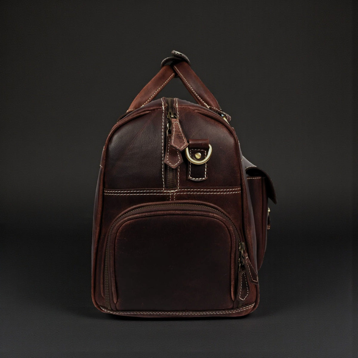 Le sac de voyage The Voyager Duffle en cuir pleine fleur vieilli marron